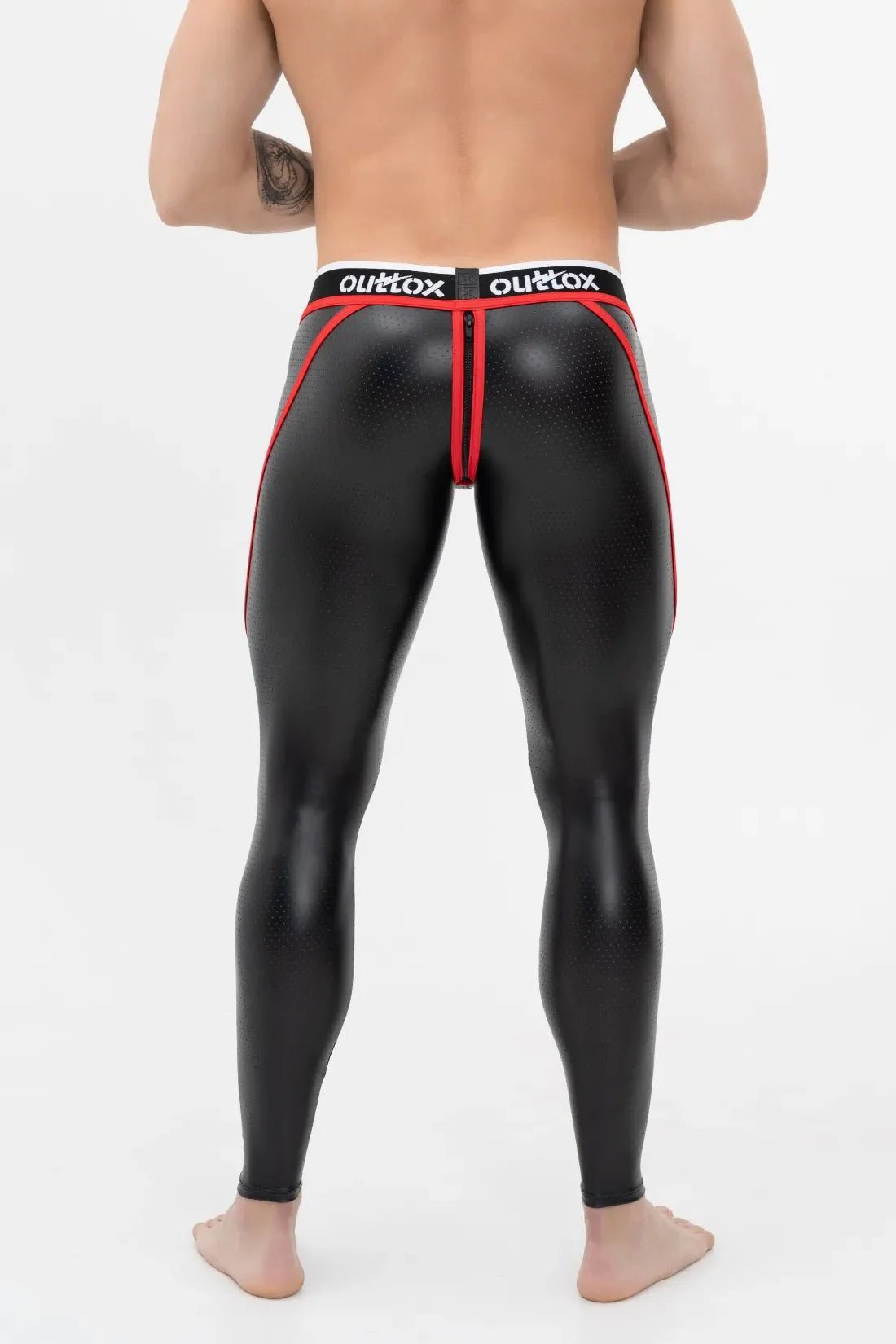 Black and red leggings featuring a zip rear and a snap codpiece, from the Outtox collection by Maskulo Global (EU).