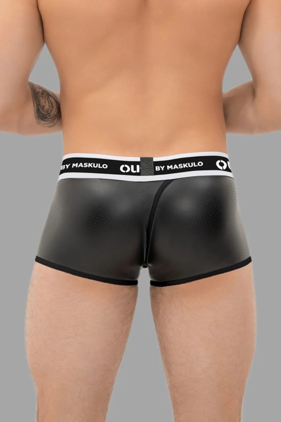 Outtox by Maskulo Black Wrapped Rear Trunk Shorts with snap codpiece. Polyester/polyurethane/elastane blend, perforated eco leather.