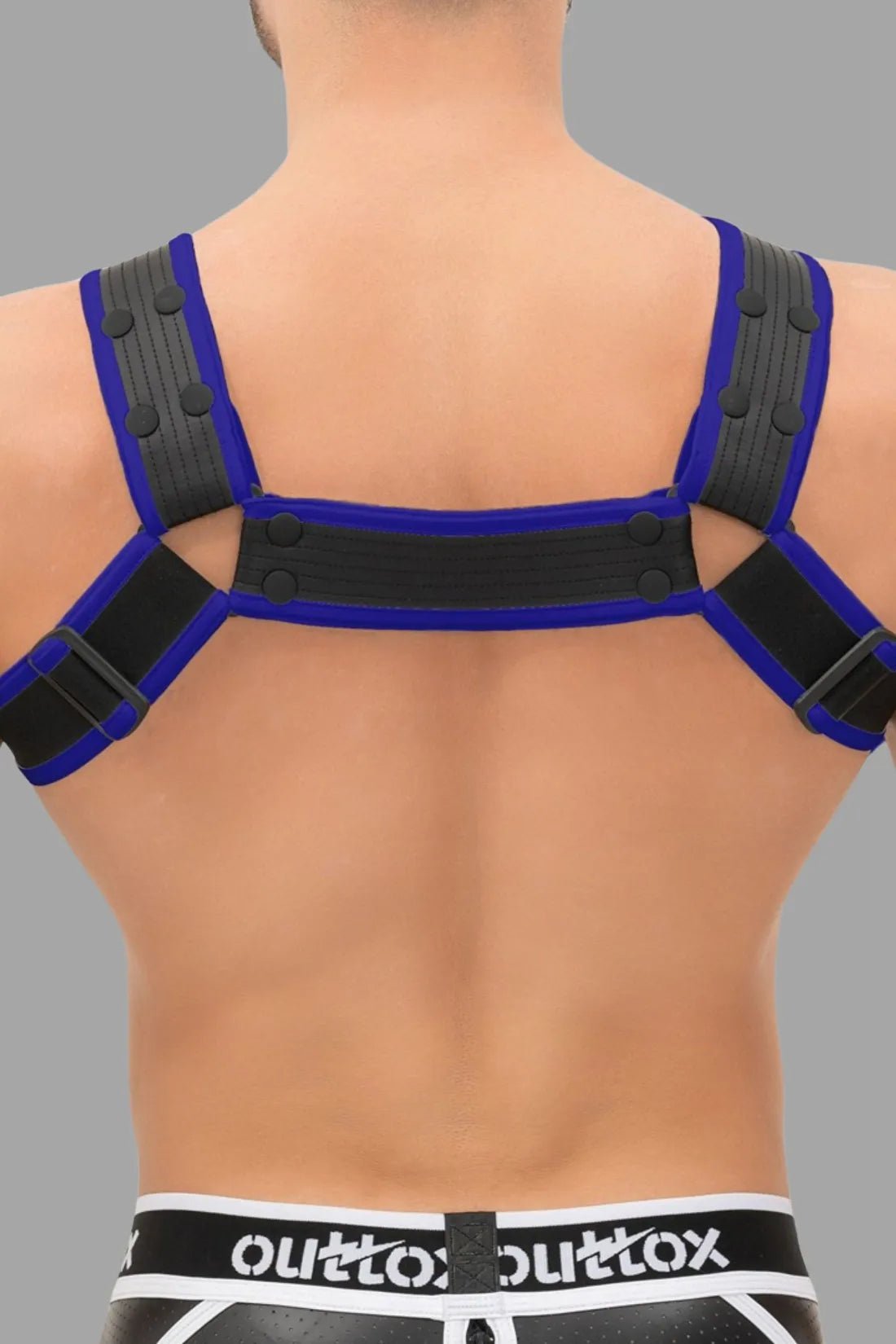 Outtox by Maskulo Bulldog Harness: black and blue PU leather straps, snaps, and buckles. Fetish clubwear accessory for men.